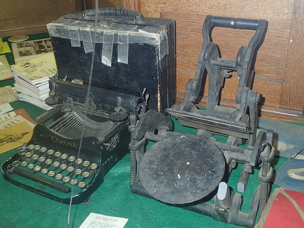 Organizations Room - Early typewriter and printing press.jpg